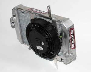 CAN-AM’S DS450 GAINS 26 PERCENT MORE COOLANT VOLUME WITH FLUIDYNE POWERSPORTS RADIATOR CAN-AM’S DS450 GAINS 26 PERCENT MORE COOLANT VOLUME WITH FLUIDYNE POWERSPORTS RADIATOR
